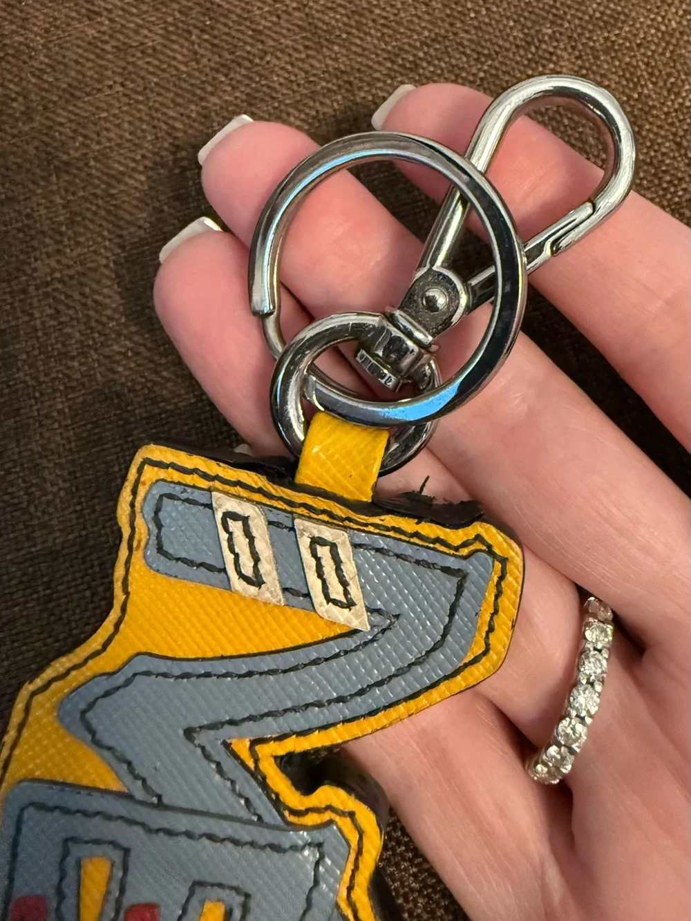 Authentic “NEVER” Prada Saffiano Leather Graffiti Keychain / Bag Charm with COA